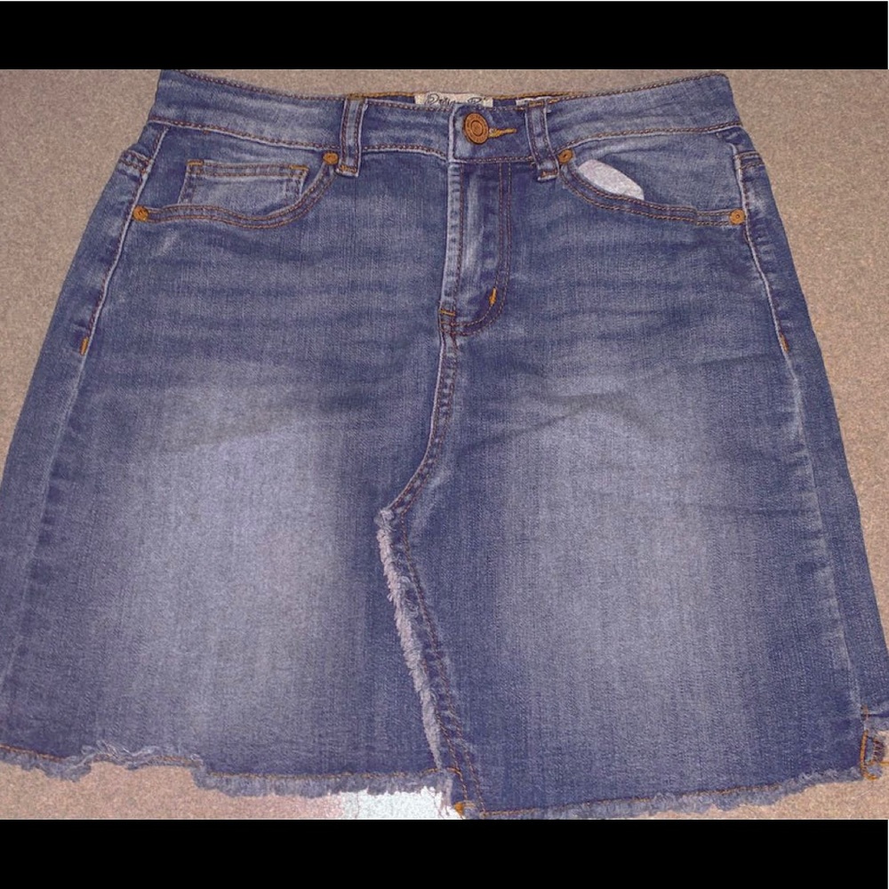 Denim skirt with teal button shirt.